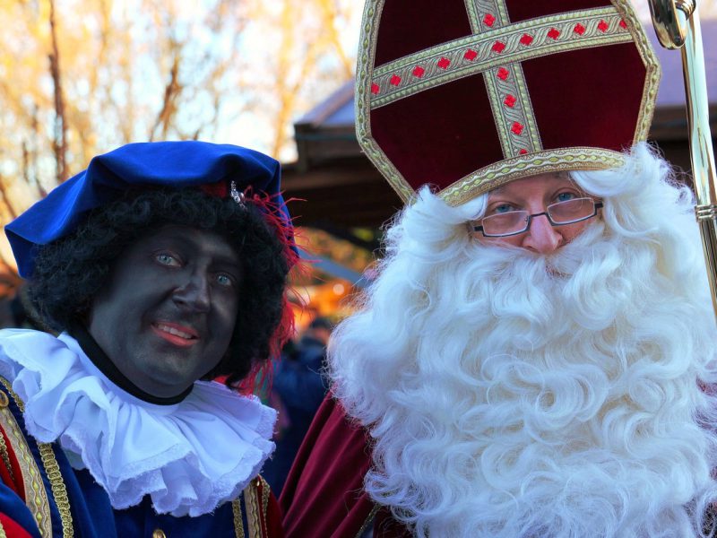 Two people in the Netherlands dressed up as Zwarte Piet and Sinterklaas