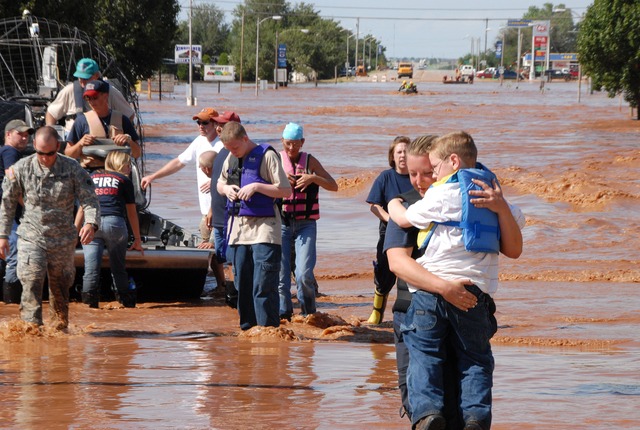 People being saved from flood waters