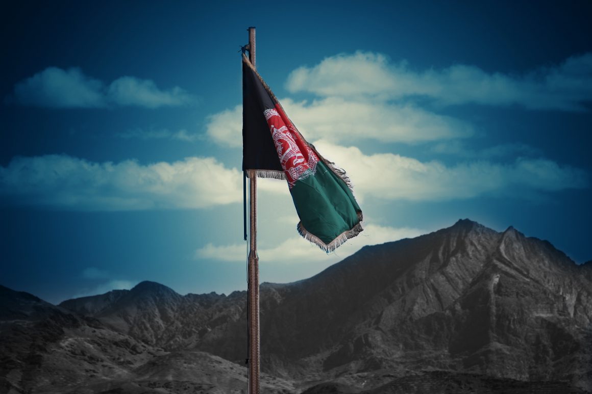 Flag of Afghanistan on a flagpole
